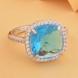 🆕️ Size 9 Simulated Aquamarine, Simulated Diamond Halo Ring in Silvertone 10.55